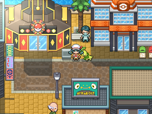 A trainer and following Pokemon walk along a golden-paved city street with tall shopfronts.