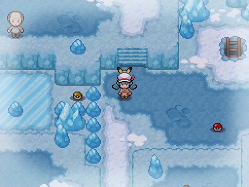 A trainer explores a pale blue cave with icy paths, crystals and ladders.